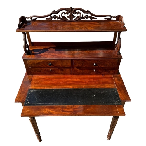 40 - A 19TH CENTURY VICTORIAN FLAME MAHOGANY LADIES’ WRITING TABLE
With scrolling and pieced gallery abov... 