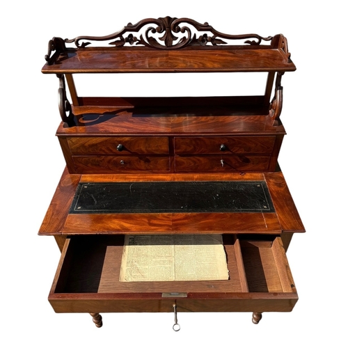 40 - A 19TH CENTURY VICTORIAN FLAME MAHOGANY LADIES’ WRITING TABLE
With scrolling and pieced gallery abov... 