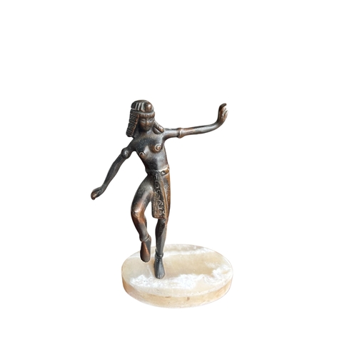 144 - AN ART DECO METAL FIGURE OF A DANCING EGYPTIAN LADY. 
(h 20.7cm x w 14.5cm x d 9cm)