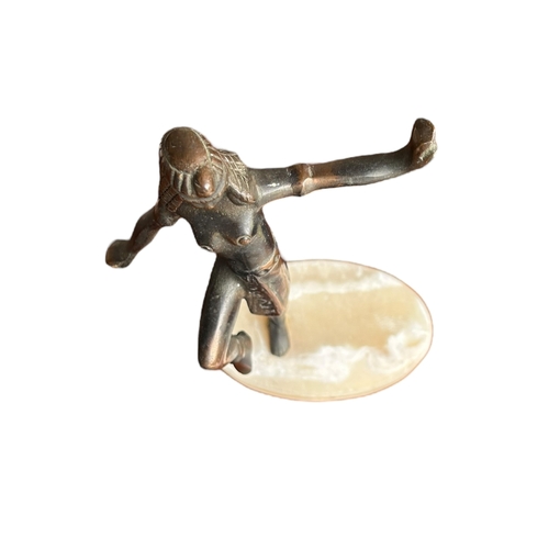 144 - AN ART DECO METAL FIGURE OF A DANCING EGYPTIAN LADY. 
(h 20.7cm x w 14.5cm x d 9cm)