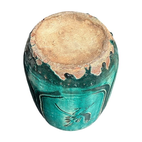 150 - A LATE 19TH/EARLY 20TH CENTURY CHINESE TURQUOISE JAR/VASE
Four panel decoration with turquoise drip ... 