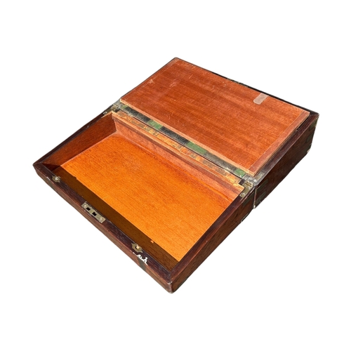 152 - AN EARLY 19TH CENTURY REGENCY ROSEWOOD AND GILT METAL WRITING SLOPE
Together with George III rosewoo... 