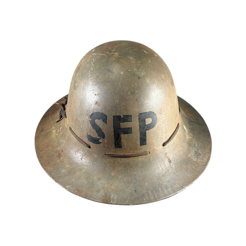 164 - A 1941 WWII HOMEFRONT STREET FIRE PARTY HELMET.
(size 7)