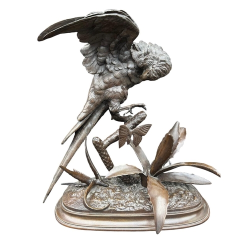 184 - FERDINAND PAUTROT, FRENCH, 1832 - 1874, A 19TH CENTURY BRONZE SCULPTURE OF A PARROT & BUTTERFLY ON N... 