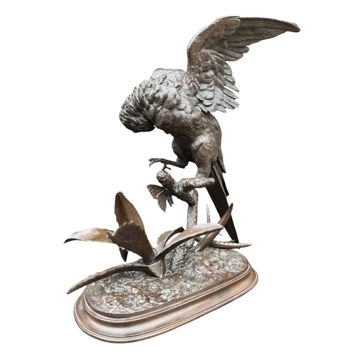 184 - FERDINAND PAUTROT, FRENCH, 1832 - 1874, A 19TH CENTURY BRONZE SCULPTURE OF A PARROT & BUTTERFLY ON N... 