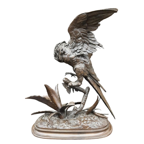 184 - FERDINAND PAUTROT, FRENCH, 1832 - 1874, A 19TH CENTURY BRONZE SCULPTURE OF A PARROT & BUTTERFLY ON N... 