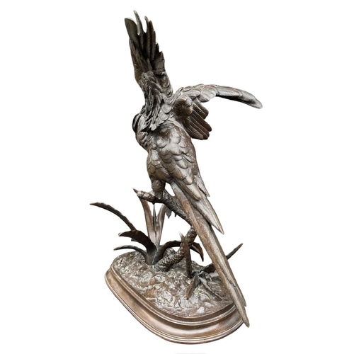 184 - FERDINAND PAUTROT, FRENCH, 1832 - 1874, A 19TH CENTURY BRONZE SCULPTURE OF A PARROT & BUTTERFLY ON N... 