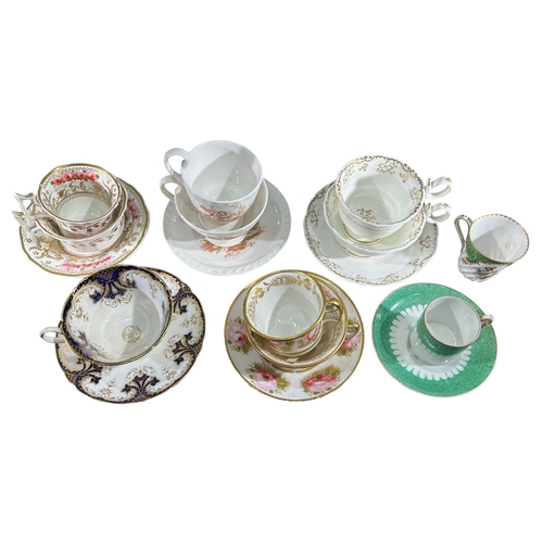 194 - A COLLECTION OF SIX 19TH CENTURY CUPS AND SAUCERS
To include a 19th Century Swansea porcelain cup an... 