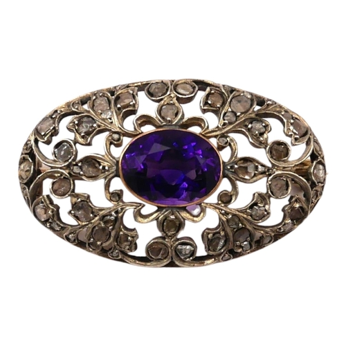 198 - AN EARLY 20TH CENTURY YELLOW/WHITE METAL, AMETHYST AND DIAMOND OVAL BROOCH
Yellow metal tested as 9c... 