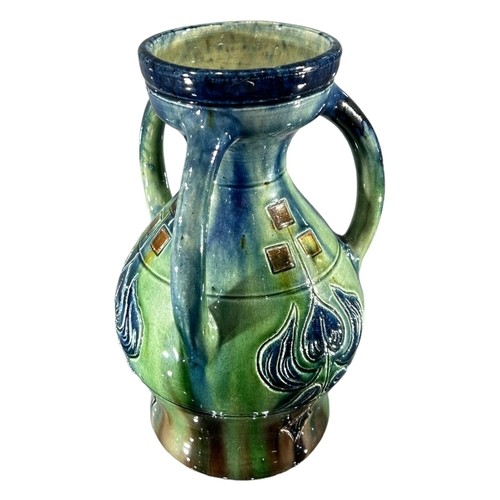 118 - A COLLECTION OF THREE 20TH CENTURY ART NOUVEAU POTTERY VASES
To include example from Roseville Mosti... 