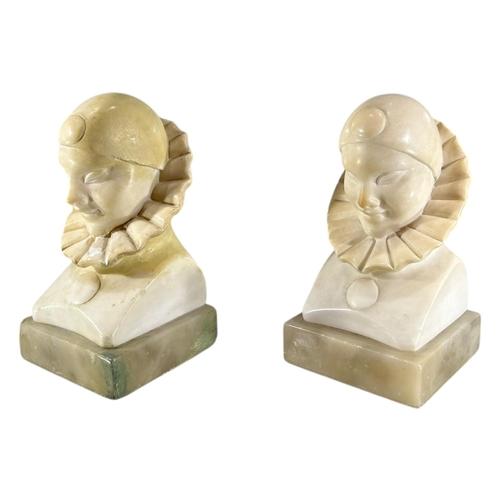 103 - A 20TH CENTURY ITALIAN ART DECO ALABASTER CARVED BUSTS OF PIERROT THE CLOWN BOOKENDS.
(h 14cm x w 7.... 