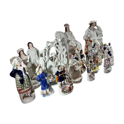 109 - A COLLECTION OF FIFTEEN 17TH/19TH CENTURY STAFFORDSHIRE FIGURES
To include spill vases, flatbacks an... 