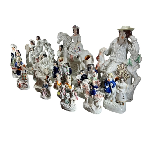 109 - A COLLECTION OF FIFTEEN 17TH/19TH CENTURY STAFFORDSHIRE FIGURES
To include spill vases, flatbacks an... 