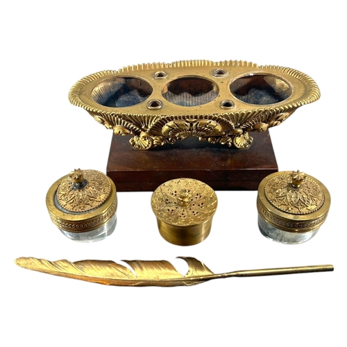 121 - A 19TH CENTURY FRENCH CHARLES X REGENCY GILT BRONZE AND MARBLE INKWELL
Ovular sarcophagus form with ... 