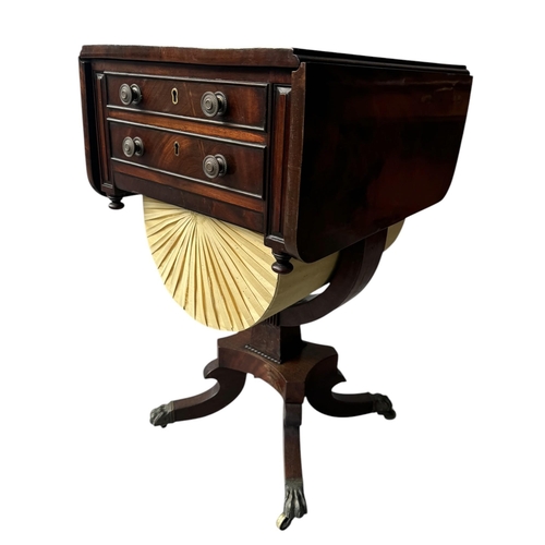 13 - A REGENCY MAHOGANY DROP LEAF LADIES’ SEWING/WORK TABLE
With two drawers above a yellow pleated silk ... 