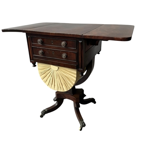 13 - A REGENCY MAHOGANY DROP LEAF LADIES’ SEWING/WORK TABLE
With two drawers above a yellow pleated silk ... 