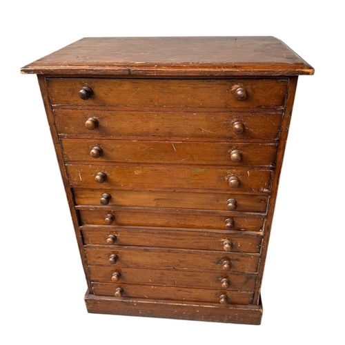 15 - A VICTORIAN PINE COLLECTORS CHEST
The ten drawers fitted with turn knob handles, on plinth base.
(h ... 