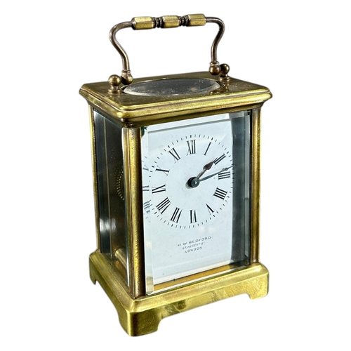 183 - H.W. BEDFORD, LONDON, AN EARLY 20TH CENTURY GILT BRASS CARRIAGE CLOCK Having white enamel dial with ... 