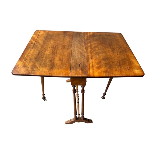 19 - A VICTORIAN FIGURED WALNUT OVAL SUTHERLAND TABLE
On turned legs and stretcher, along with a late Vic... 