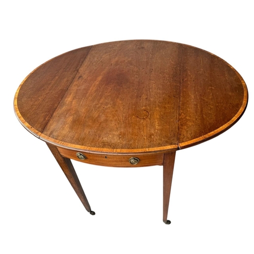 21 - A LATE 18TH CENTURY SHERATON PERIOD MAHOGANY AND SATINWOOD BANDED PEMBROKE TABLE
Oval form, with sin... 