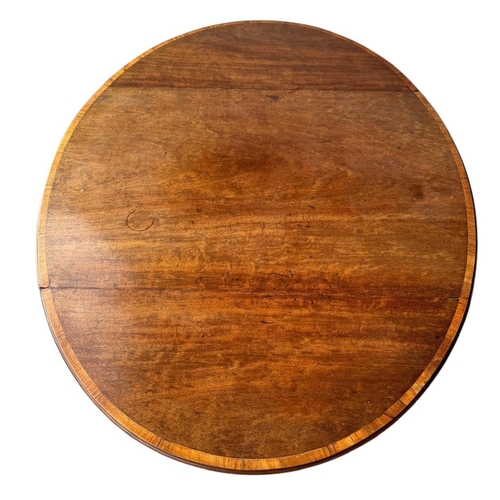 21 - A LATE 18TH CENTURY SHERATON PERIOD MAHOGANY AND SATINWOOD BANDED PEMBROKE TABLE
Oval form, with sin... 