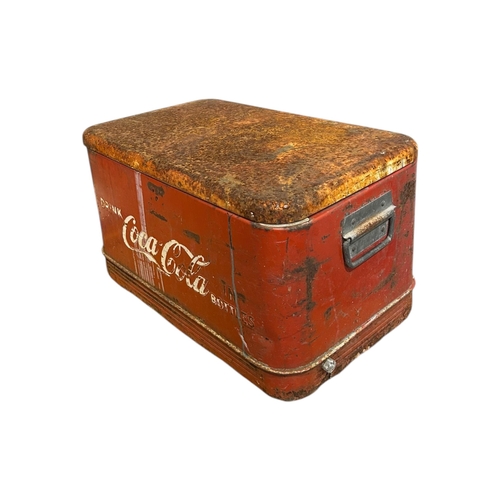 63 - ADVERTISEMENT INTEREST, A 20TH CENTURY COCA COLA DRINKS BOX/COOLER
Having aged patina with ‘Drink Co... 