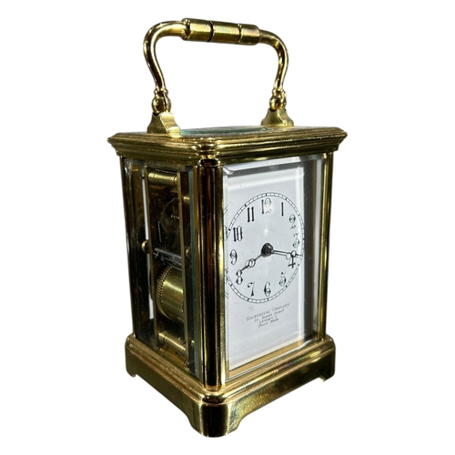 65 - GOLDSMITHS COMPANY, A LATE 19TH/EARLY 20TH CENTURY FRENCH CARRIAGE CLOCK
Having white enamel dial wi... 