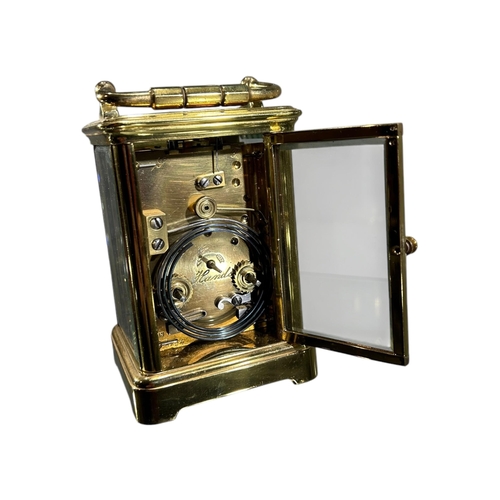 65 - GOLDSMITHS COMPANY, A LATE 19TH/EARLY 20TH CENTURY FRENCH CARRIAGE CLOCK
Having white enamel dial wi... 