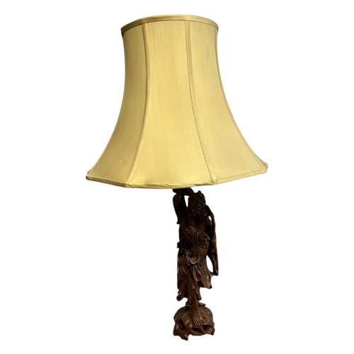 71 - A LARGE CHINESE CARVED ROOT WOOD FIGURAL LAMP
Together with a frosted glass lamp and one other. 
(Ch... 