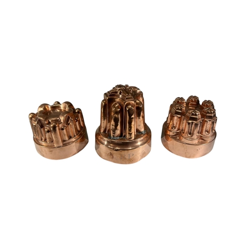 78 - A COLLECTION OF 19TH/EARLY 20TH CENTURY COPPER AND BRASSWARE
To include three jelly moulds, teapot, ... 