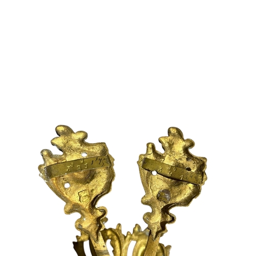 79 - SEVEN PAIRS OF 19TH CENTURY FRENCH GILT BRONZE AND ORMOLU CURTAIN TIEBACKS
Majority having impressed... 