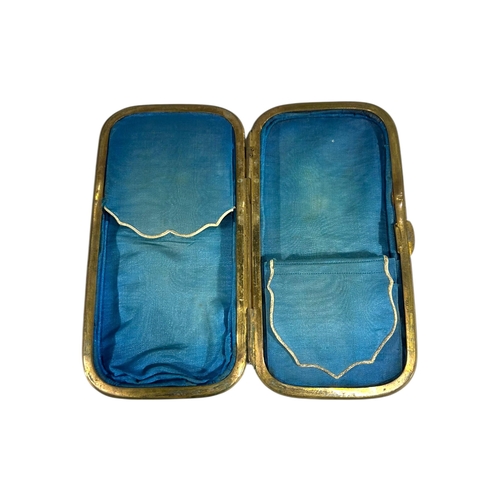 84 - A 19TH CENTURY TORTOISESHELL SPECTACLE CASE
Having yellow metal shield cartouche and blue satin line... 