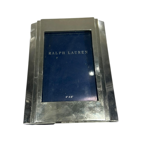 86 - RALPH LAUREN, A VINTAGE SILVERED PICTURE FRAME. 
(21cm x 15.8cm)