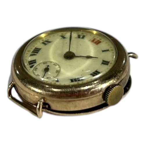 87 - AN EARLY 20TH CENTURY 9CT GOLD CASED WRISTWATCH
Having beige enamel dial with Roman numerals in blac... 