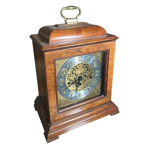 90 - HOWARD MILLER, 59TH ANNIVERSARY EDITION WOODEN CASED MANTLE CLOCK
Having a silvered dial with Arabic... 