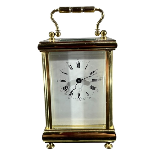 95 - L’EPÉE, FRANCE, A 20TH CENTURY FRENCH GILT BRASS CARRIAGE CLOCK
Having white enamel dial with black ... 