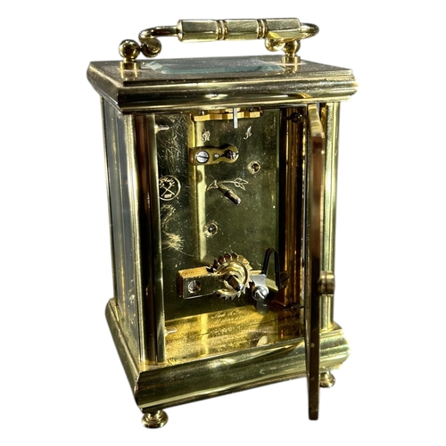 95 - L’EPÉE, FRANCE, A 20TH CENTURY FRENCH GILT BRASS CARRIAGE CLOCK
Having white enamel dial with black ... 