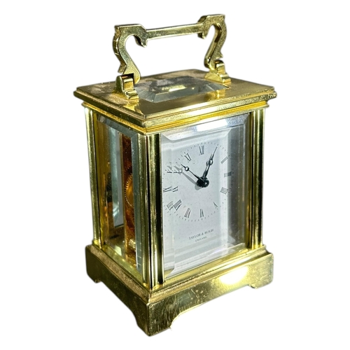 98 - TAYLOR & BLIGH, TWO 20TH CENTURY ENGLISH GILT BRASS MINIATURE CARRIAGE CLOCK
Both having white ename... 