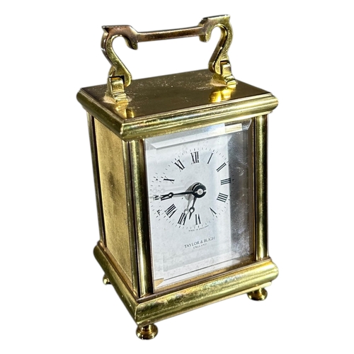 98 - TAYLOR & BLIGH, TWO 20TH CENTURY ENGLISH GILT BRASS MINIATURE CARRIAGE CLOCK
Both having white ename... 