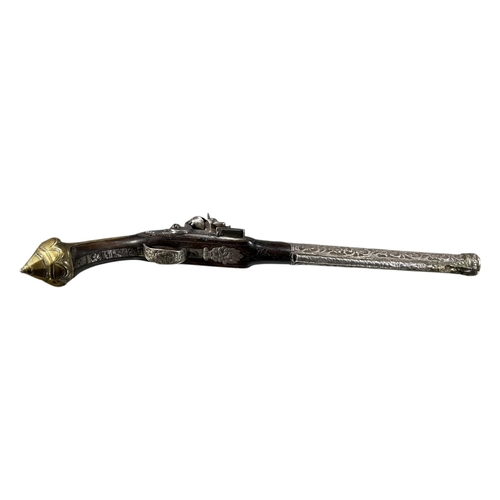 185A - AN EARLY 19TH CENTURY OTTOMAN EMPIRE TURKISH SILVER AND GILT BRASS FLINTLOCK PISTOL
Having chased an... 