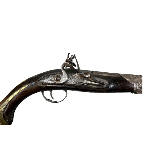 185A - AN EARLY 19TH CENTURY OTTOMAN EMPIRE TURKISH SILVER AND GILT BRASS FLINTLOCK PISTOL
Having chased an... 