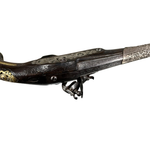 185A - AN EARLY 19TH CENTURY OTTOMAN EMPIRE TURKISH SILVER AND GILT BRASS FLINTLOCK PISTOL
Having chased an... 