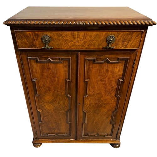 189A - MAPPIN & WEBB, A QUEEN ANNE DESIGN CARVED WALNUT CABINET
With gadrooned edge with single fitted draw... 