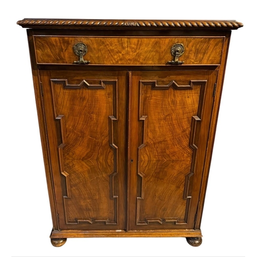 189A - MAPPIN & WEBB, A QUEEN ANNE DESIGN CARVED WALNUT CABINET
With gadrooned edge with single fitted draw... 