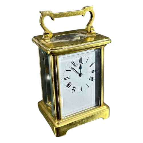 99 - A LATE 19TH/EARLY 20TH CENTURY FRENCH GILT BRASS CARRIAGE CLOCK
Together with a 20th Century Metamec... 