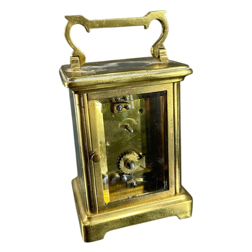 99 - A LATE 19TH/EARLY 20TH CENTURY FRENCH GILT BRASS CARRIAGE CLOCK
Together with a 20th Century Metamec... 