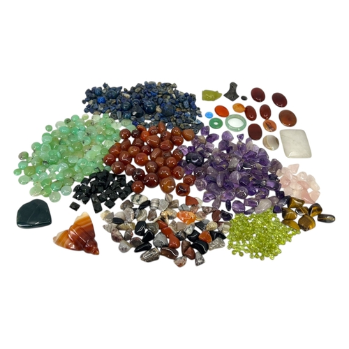 184A - JEWELLERY MAKING INTEREST, A COLLECTION OF SEMI-PRECIOUS STONES AND OTHERS
To include carnelian, mos... 