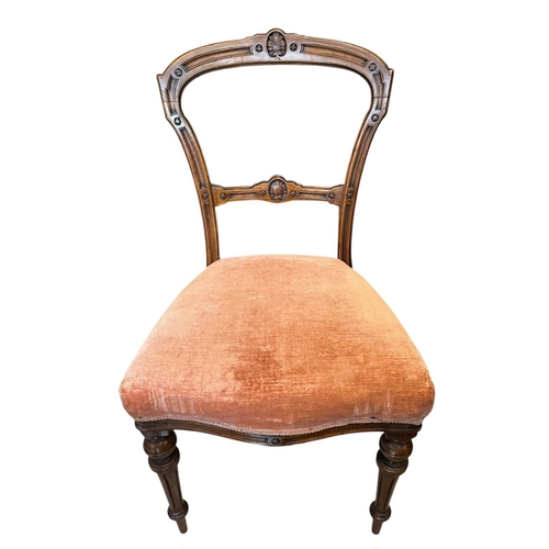 4A - A SET OF FOUR 19TH CENTURY VICTORIAN CARVED WALNUT SIDE CHAIRS
With upholstered seats, raised on tur... 