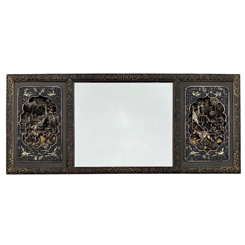 6A - A 19TH CENTURY CHINESE CARVED GILTWOOD AND PAINTED HARDWOOD MIRROR
The frame decorated with trees an... 