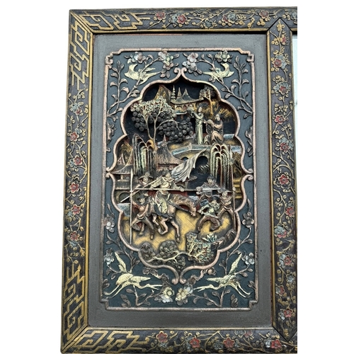 6A - A 19TH CENTURY CHINESE CARVED GILTWOOD AND PAINTED HARDWOOD MIRROR
The frame decorated with trees an... 